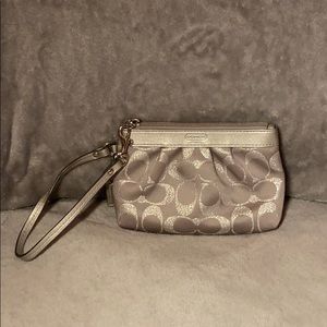 Coach silver fabric monogrammed coach wristlet. 🎀